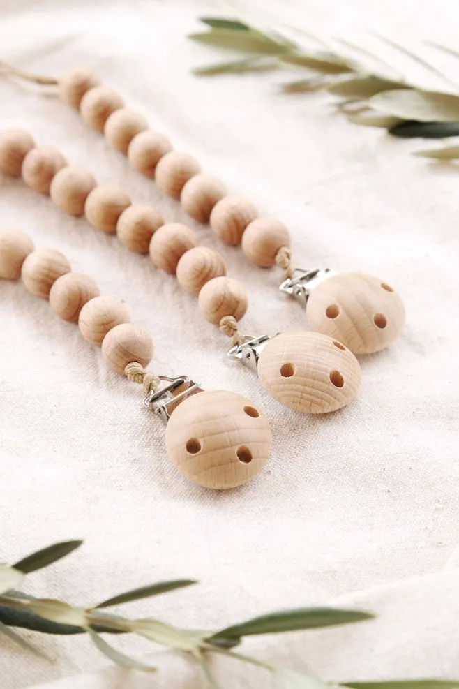 The Frenchie Knot Wood Beaded Pacifier Clip