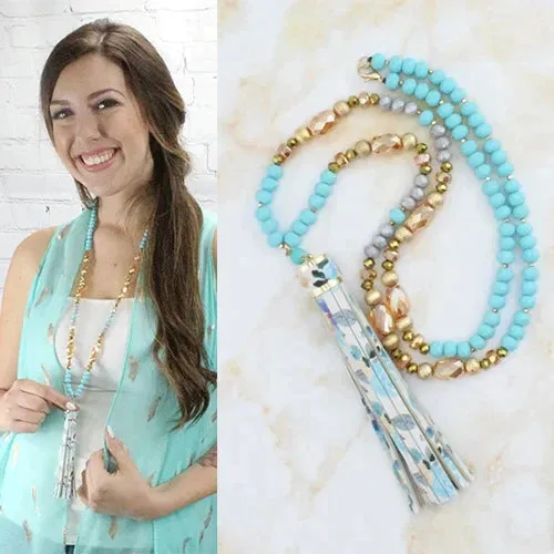 Turquoise & gold crystal necklace with floral tassel